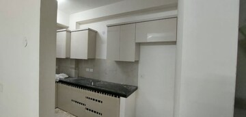 Kitchen in 2.5 BHK Apartment at Smart World Gems, Sector 89 – for Rent