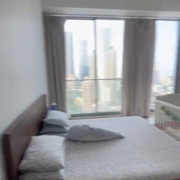 Living Room in 4 BHK Apartment at Rustomjee Crown, Gokhale Road – for Rent