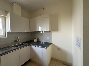 Kitchen in 3 BHK Apartment at Ansal Crown Heights, Sector 80 – for Rent
