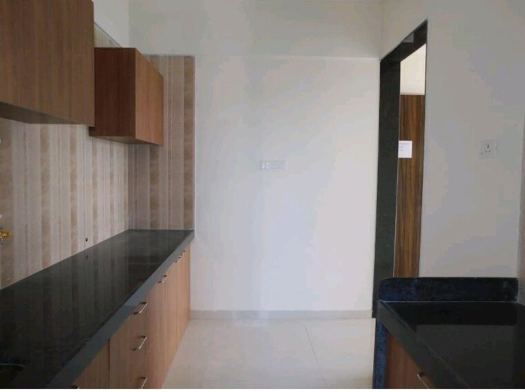 Kitchen, sheth-zuri 2 Bedroom 517 Sq.Ft. Apartment In Laxmi Nagar Thane 9778026
