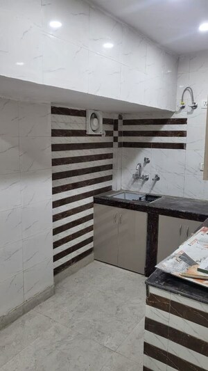 Kitchen in 2 BHK Builder Floor at Kalkaji – for Rent