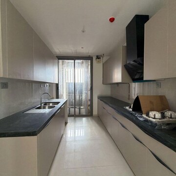 Kitchen in 4 BHK Apartment at Rustomjee Crown, Gokhale Road – for Rent