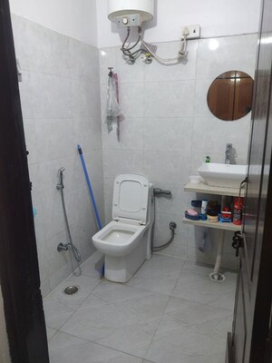 Bathroom in 2 BHK Builder Floor at Gyan Khand I – for Rent