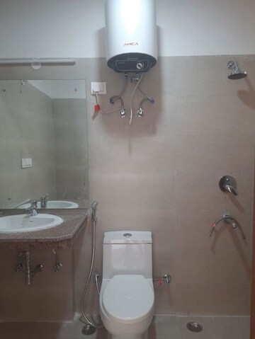 Bathroom in 3 BHK Apartment at Mahagun Mywoods, Sector 16c Greater Noida – for Rent
