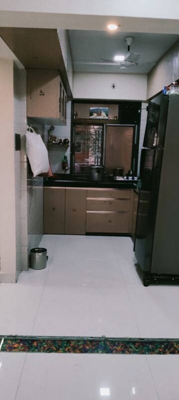 Kitchen in 2 BHK Apartment at Kosmos Vinayak Tower, Malad East – for Sale