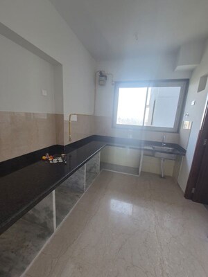 Kitchen in 3 BHK Apartment at Courtyard by Narang Realty and The Wadhwa Group, Pokhran Road No Two – for Sale