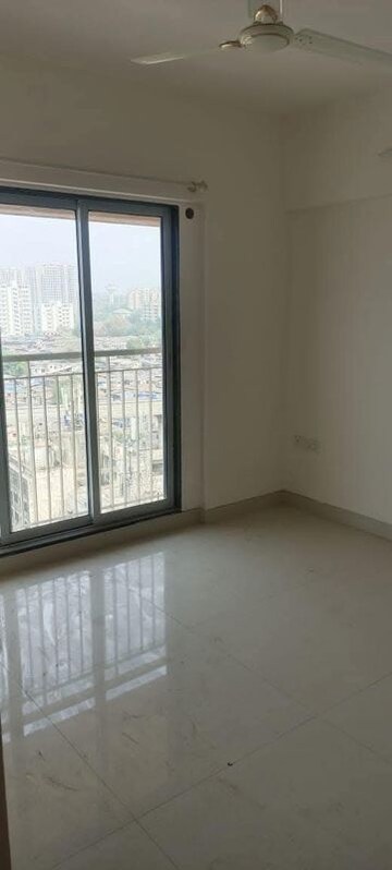 Room in 2 BHK Apartment at Raj Infinia, Malad West – for Rent