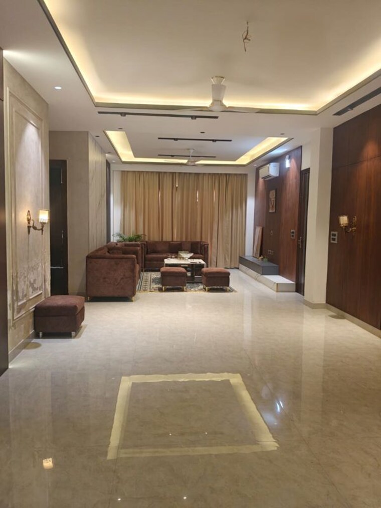 Living Room, ansal-api-versalia 4 Bedroom 300 Sq.Yd. Builder Floor In Sector 67a Gurgaon 9779383