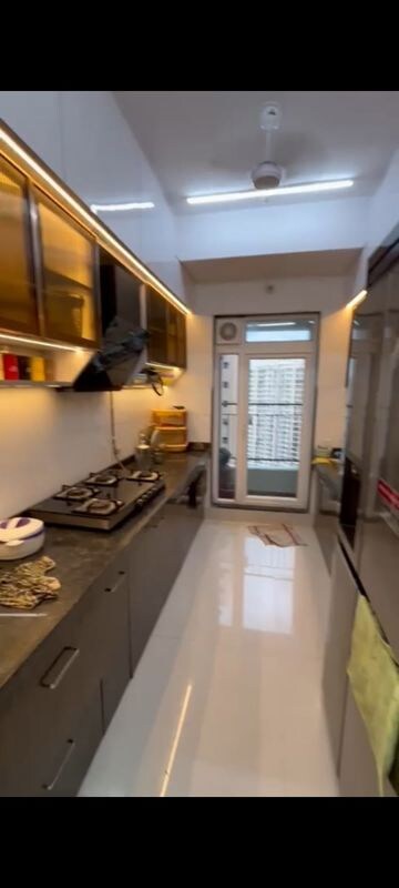 Living Room in 2 BHK Apartment at Rustomjee Urbania, Thane West – for Sale