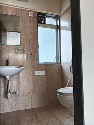 Bathroom in 3 BHK Apartment at Rajnigandha CHS Vasant Vihar, Vasant Vihar – for Rent