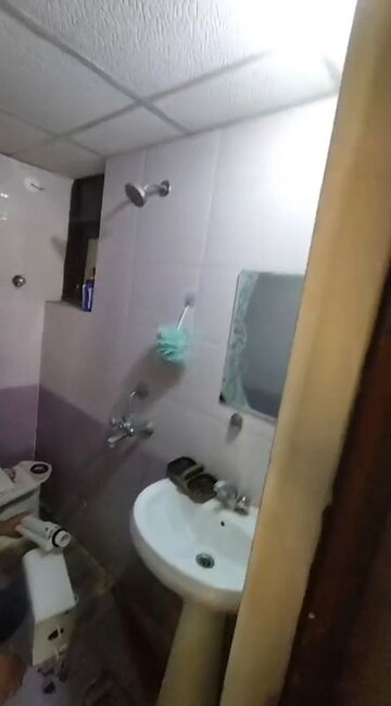Bathroom in 2 BHK Apartment at Shyam Bankey Bihari Sharnam, Raj Nagar Extension – for Sale