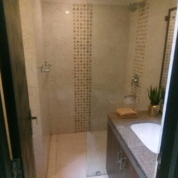 Bathroom in Studio Apartment at Eldeco Edge, Sector 119 – for Sale