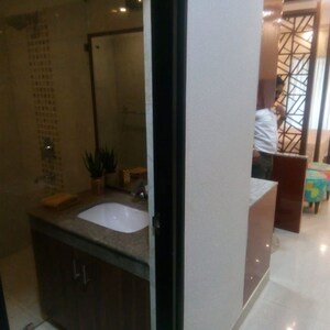 Bathroom in Studio Apartment at Eldeco Edge, Sector 119 – for Sale