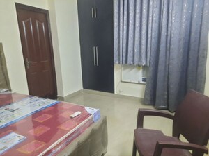 Bedroom in 4 BHK Apartment at RWA Jalvayu Vihar, Sector 25 – for Rent