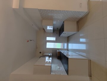 Kitchen in 2.5 BHK Apartment at Samridhi Luxuriya Avenue, Sector 150 – for Sale