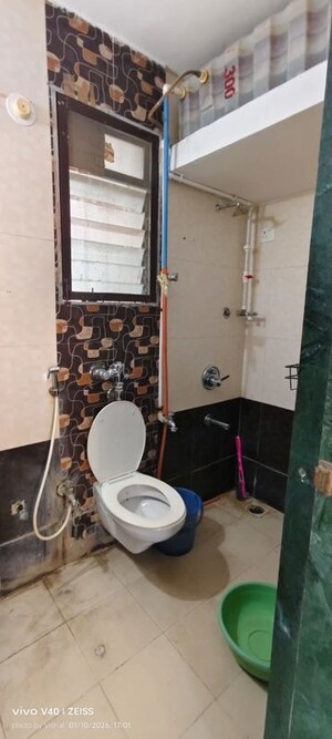 Bathroom in 1 BHK Apartment at Vihang Valley Phase1, Kasarvadavali – for Rent