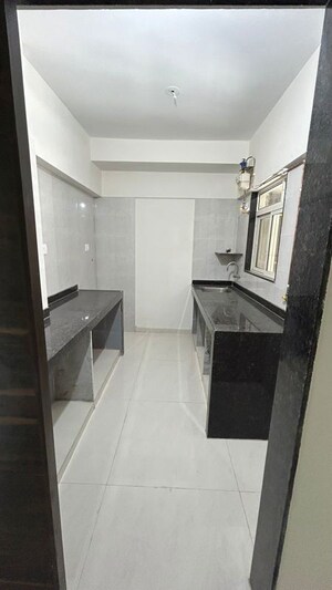 Kitchen in 3 BHK Apartment at Shreeji Atlantis, Malad West – for Rent