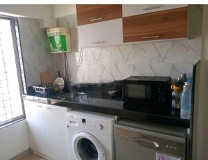 Kitchen in 5 BHK Apartment at Prarthna Heights, Parel – for Rent