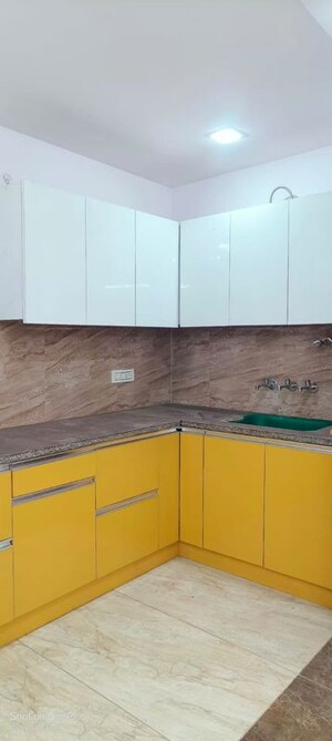 Kitchen in 2 BHK Apartment at Sector 18a Dwarka – for Rent