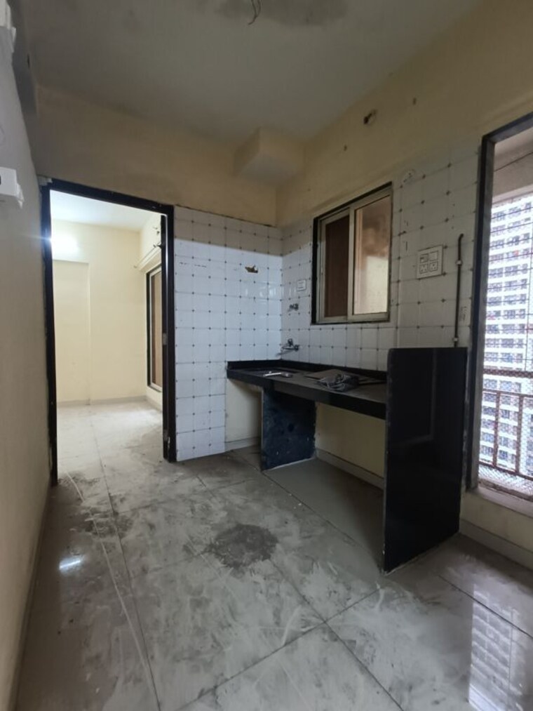 Kitchen, seven-apna-ghar-phase-2-plot-a 1 Bedroom 575 Sq.Ft. Apartment In Mira Road Thane 9780584