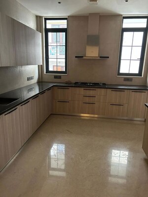 Kitchen in 4 BHK Apartment at Vasant Vihar – for Sale