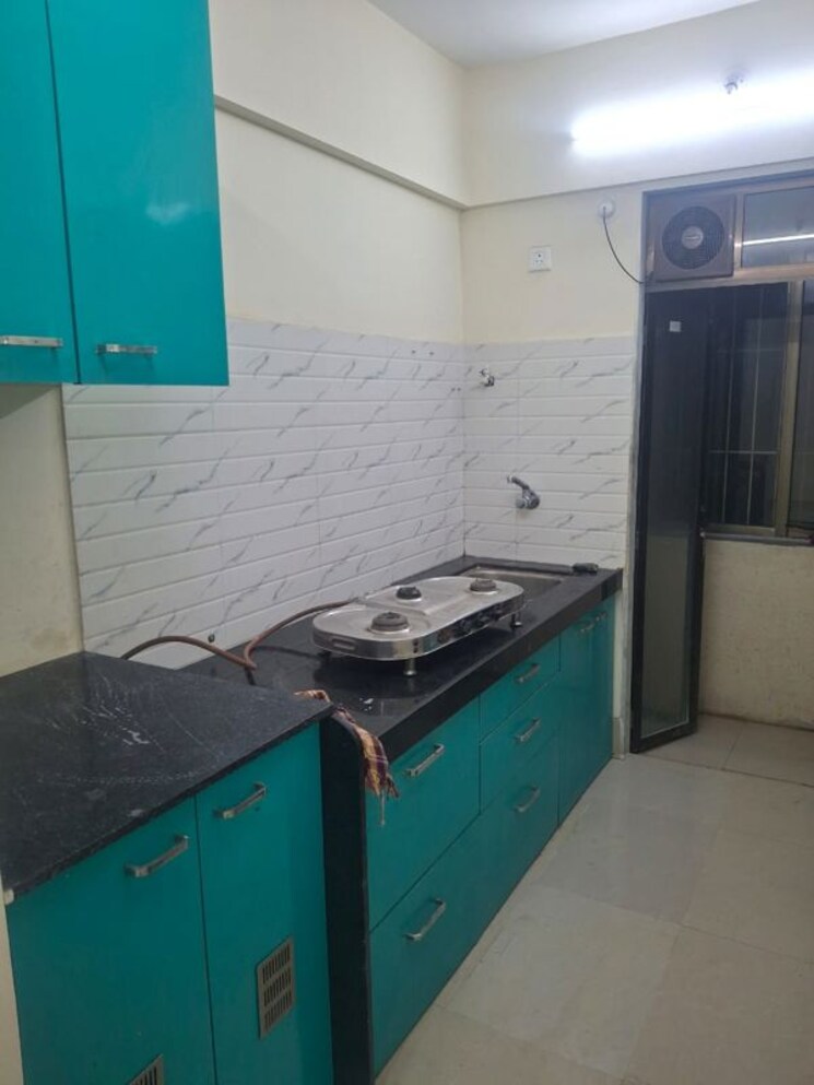 Kitchen, paradigm-zenith-pushpanjali-residency-phase-iii 1 Bedroom 425 Sq.Ft. Apartment In Ghodbunder Road Thane 9780716