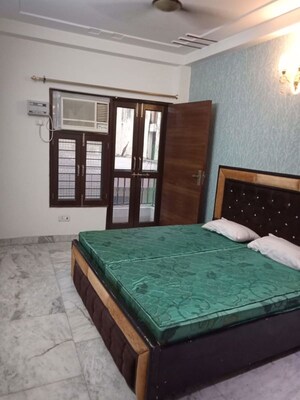 Bedroom in 2 BHK Builder Floor at Khirki Extension – for Rent