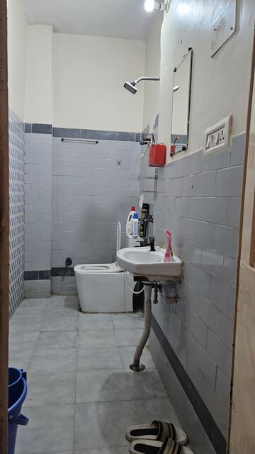 Bathroom in 1 RK Apartment at Arun Vihar Sector 37, Sector 37 – for Rent