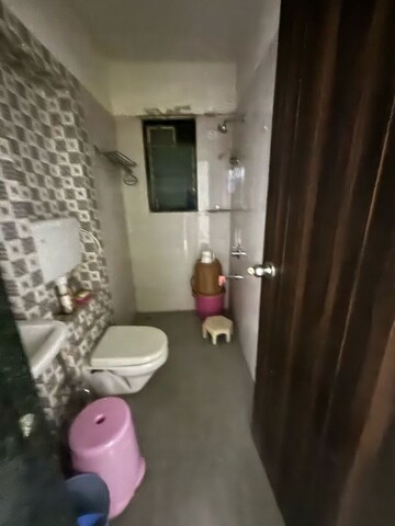 Bathroom in 2 BHK Apartment at Neev Galaxy, Malad East – for Rent