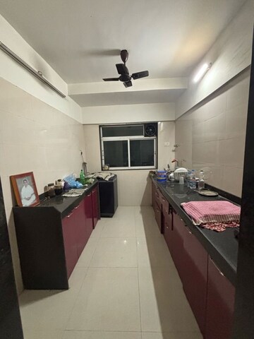 Kitchen in 2 BHK Apartment at Neev Galaxy, Malad East – for Rent