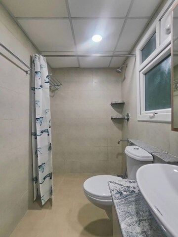 Bathroom in  Apartment at Bhartiya Nikoo Homes Phase 2, Thanisandra Main Road – for Rent