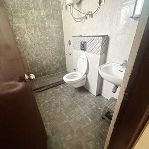 Bathroom in 3 BHK Apartment at NK Sharma Savitry Greens, Vip Road – for Rent