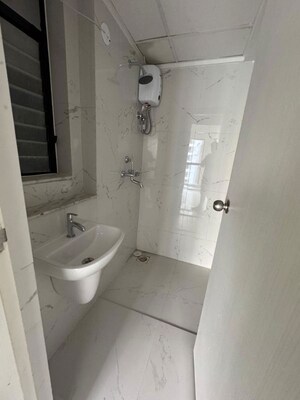 Bathroom in 1 BHK Apartment at Runwal Gardens Phase 3, Dombivli East – for Rent