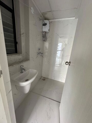 Bathroom in 1 BHK Apartment at Runwal Gardens Phase 3, Dombivli East – for Rent