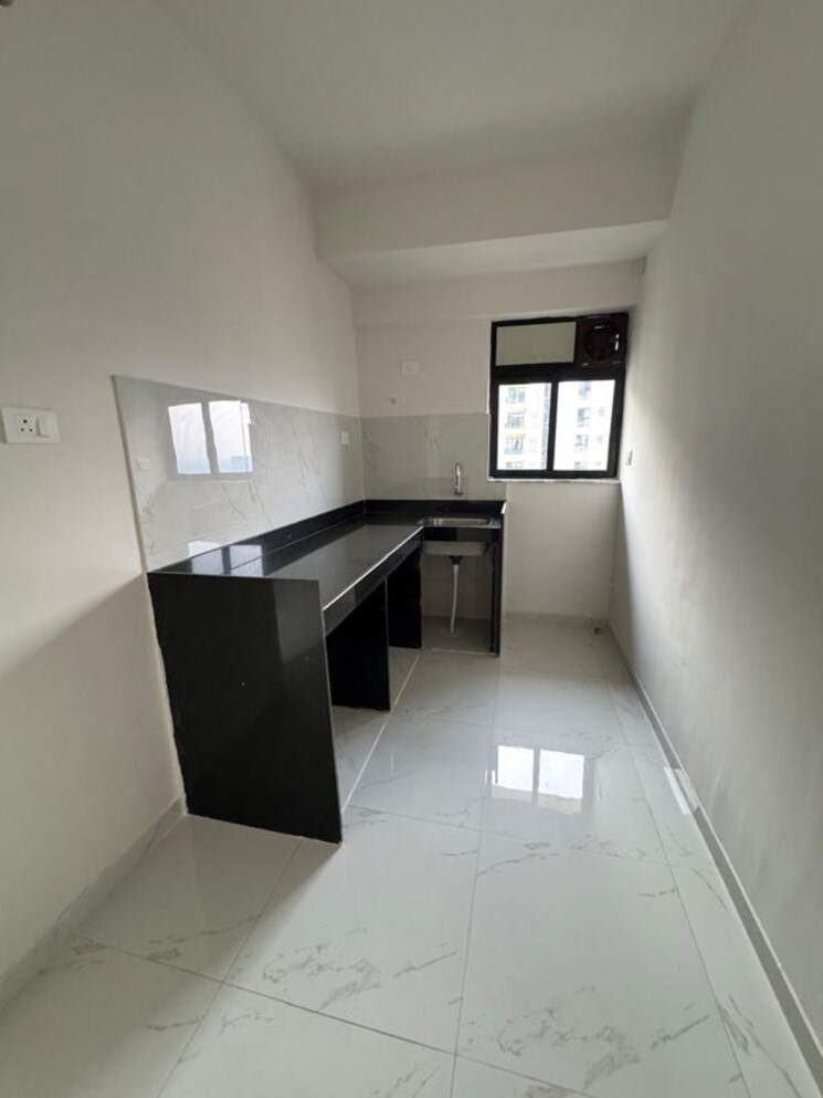 Kitchen, runwal-gardens-phase-3 1 Bedroom 344 Sq.Ft. Apartment In Dombivli East Thane 9781287