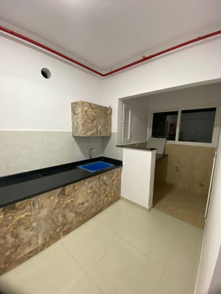 Kitchen, ajmera-lakeside-paradise 2 Bedroom 1165 Sq.Ft. Apartment In Yelahanka Bangalore 9781293