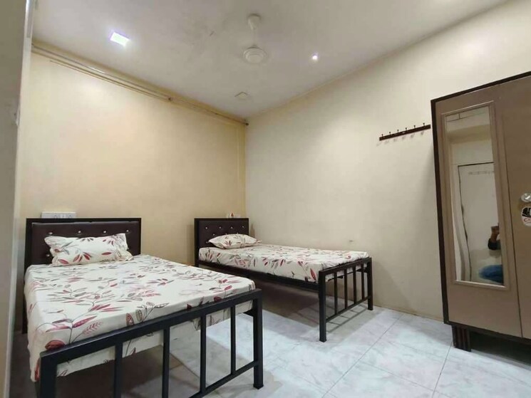 Bedroom, goregaon west Pg For Boys & Girls In Goregaon West 9781294