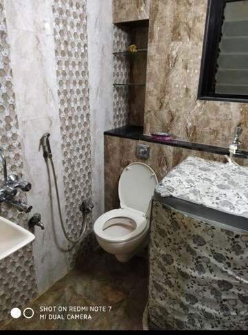 Bathroom in 2 BHK Apartment at Salasar Woods, Mira Road – for Sale