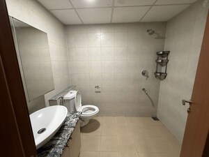 Bathroom in 2 BHK Apartment at Bhartiya City Nikoo Homes II, Thanisandra Main Road – for Sale