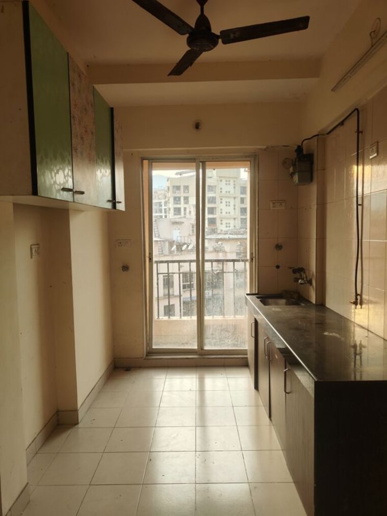 Kitchen, ravi-estate 2 Bedroom 750 Sq.Ft. Apartment In Pokhran Road No One Thane 9781508