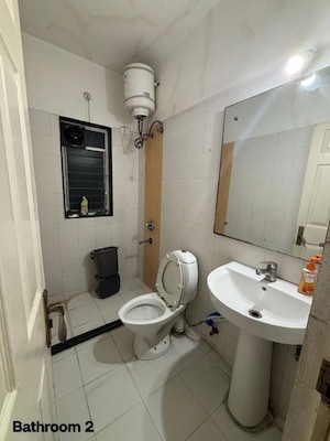 Bathroom in 2 BHK Apartment at Mirchandani Palms, Rahatani – for Rent