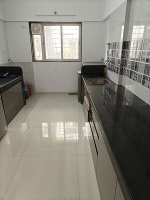 Kitchen in 2.5 BHK Apartment at Kakade City, Karve Nagar – for Rent