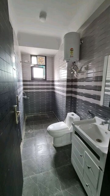 Bathroom in 3 BHK Builder Floor at Chattarpur – for Rent