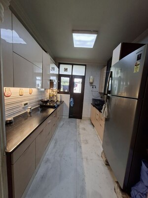 Kitchen in 3 BHK Builder Floor at Green Park – for Sale