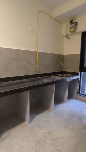 Kitchen in 1 BHK Apartment at Ajmera Boulevard, Malad West – for Rent