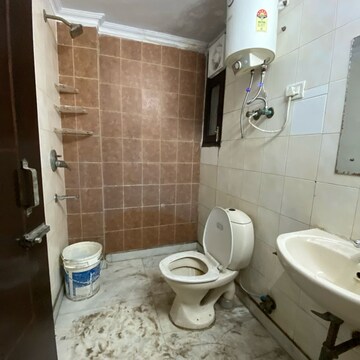 Bathroom in 3 BHK Builder Floor at Chattarpur – for Rent