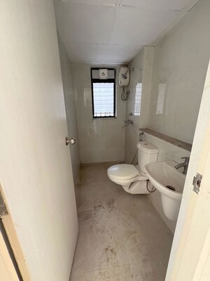 Bathroom in 3 BHK Apartment at Runwal Gardens Phase 2, Dombivli East – for Sale