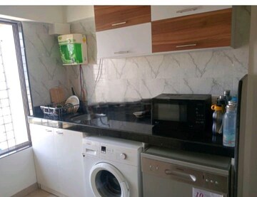 Kitchen in 5 BHK Apartment at Prarthna Heights, Parel – for Sale