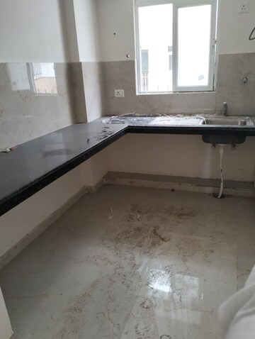 Kitchen in 2.5 BHK Apartment at Smart World Gems, Sector 89 – for Rent