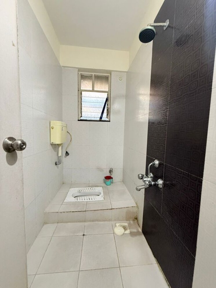 Bathroom, bhansali-whispering-winds 2 Bedroom 682 Sq.Ft. Apartment In Pashan Pune 9781947